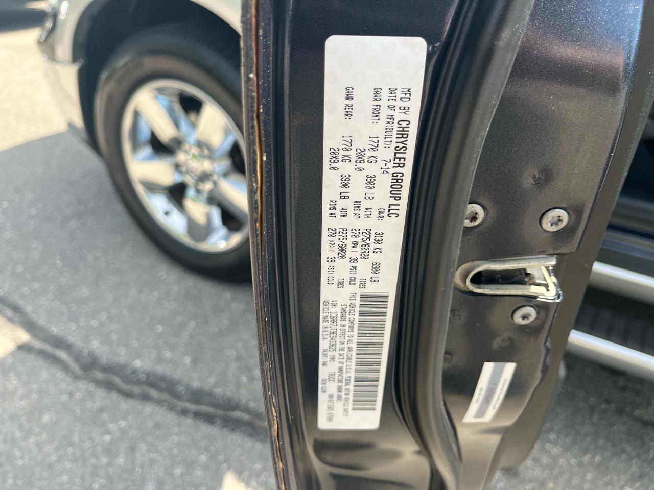 RAM 1500 4WD Quad Cab 140.5" Laramie 2014