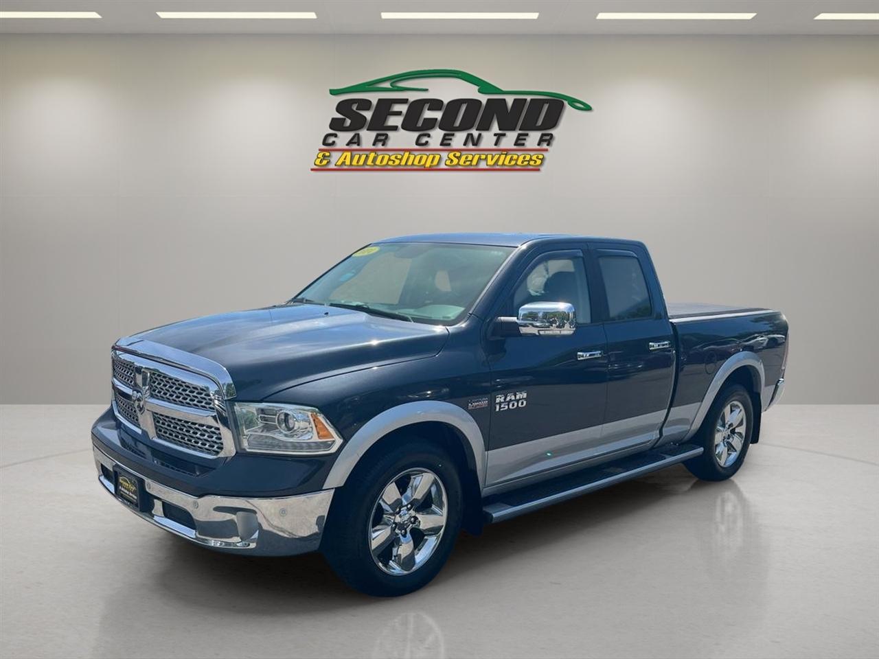 RAM 1500 4WD Quad Cab 140.5" Laramie 2014