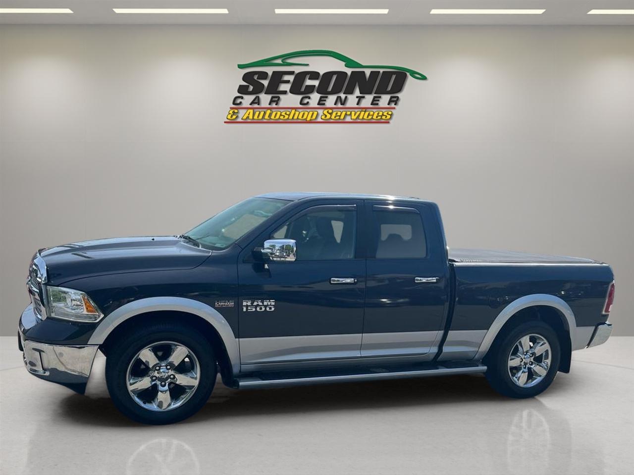 RAM 1500 4WD Quad Cab 140.5" Laramie 2014
