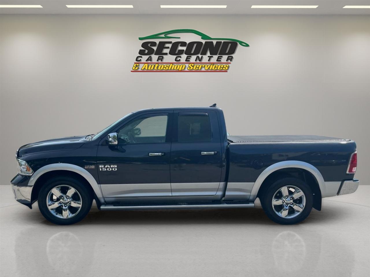 RAM 1500 4WD Quad Cab 140.5" Laramie 2014