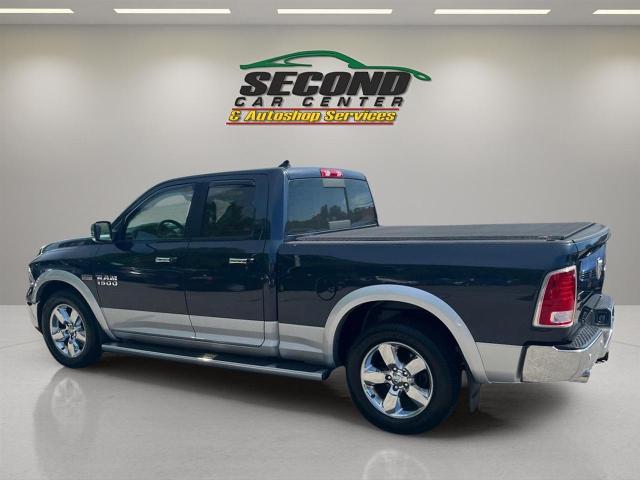 RAM 1500 4WD Quad Cab 140.5" Laramie 2014