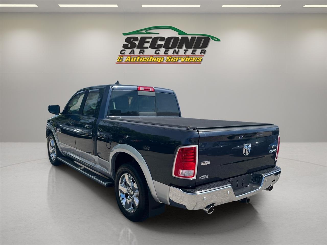 RAM 1500 4WD Quad Cab 140.5" Laramie 2014