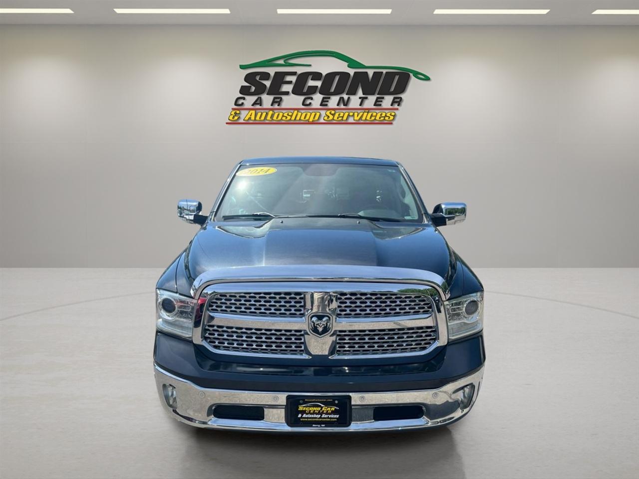 RAM 1500 4WD Quad Cab 140.5" Laramie 2014