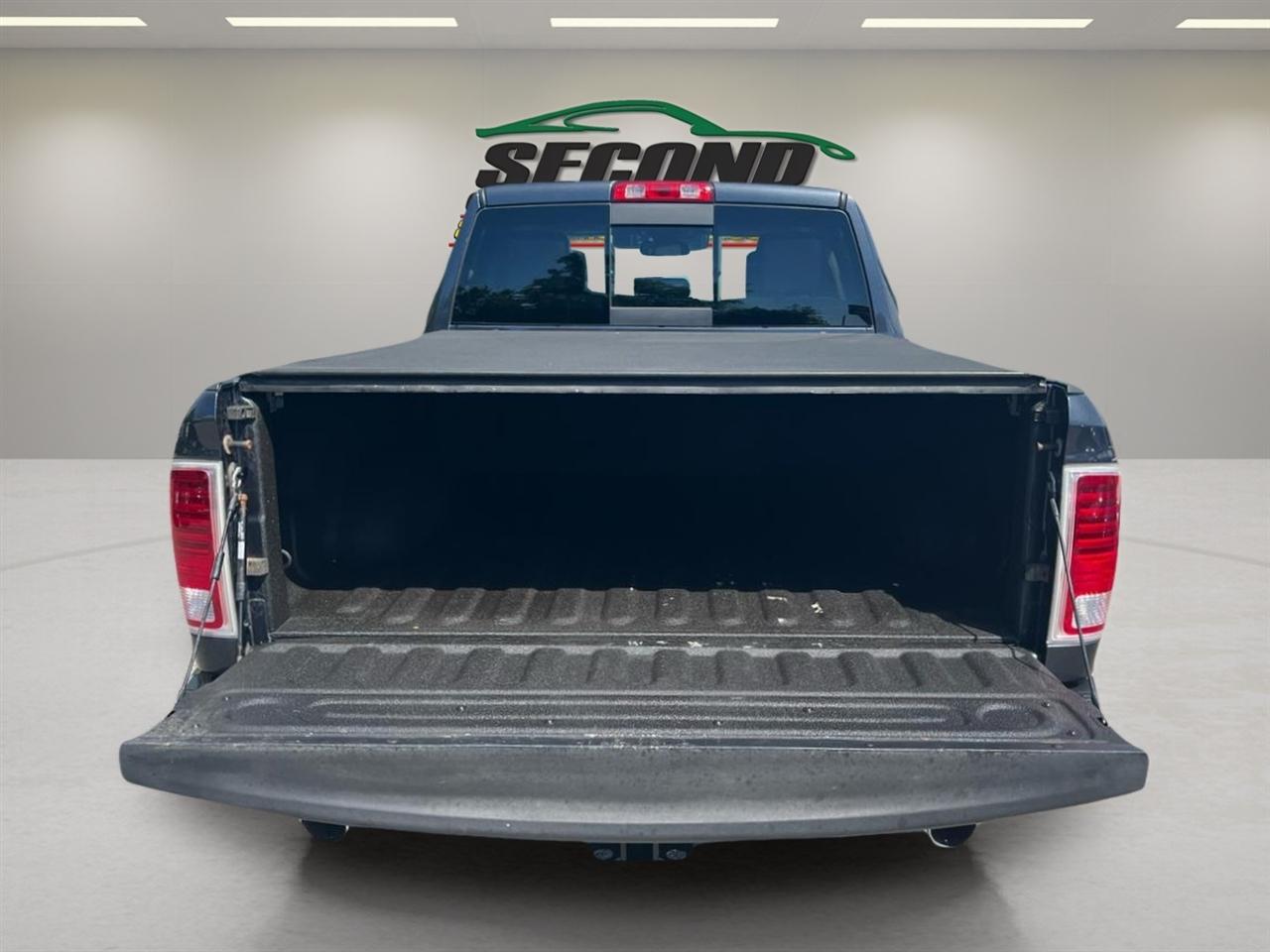 RAM 1500 4WD Quad Cab 140.5" Laramie 2014