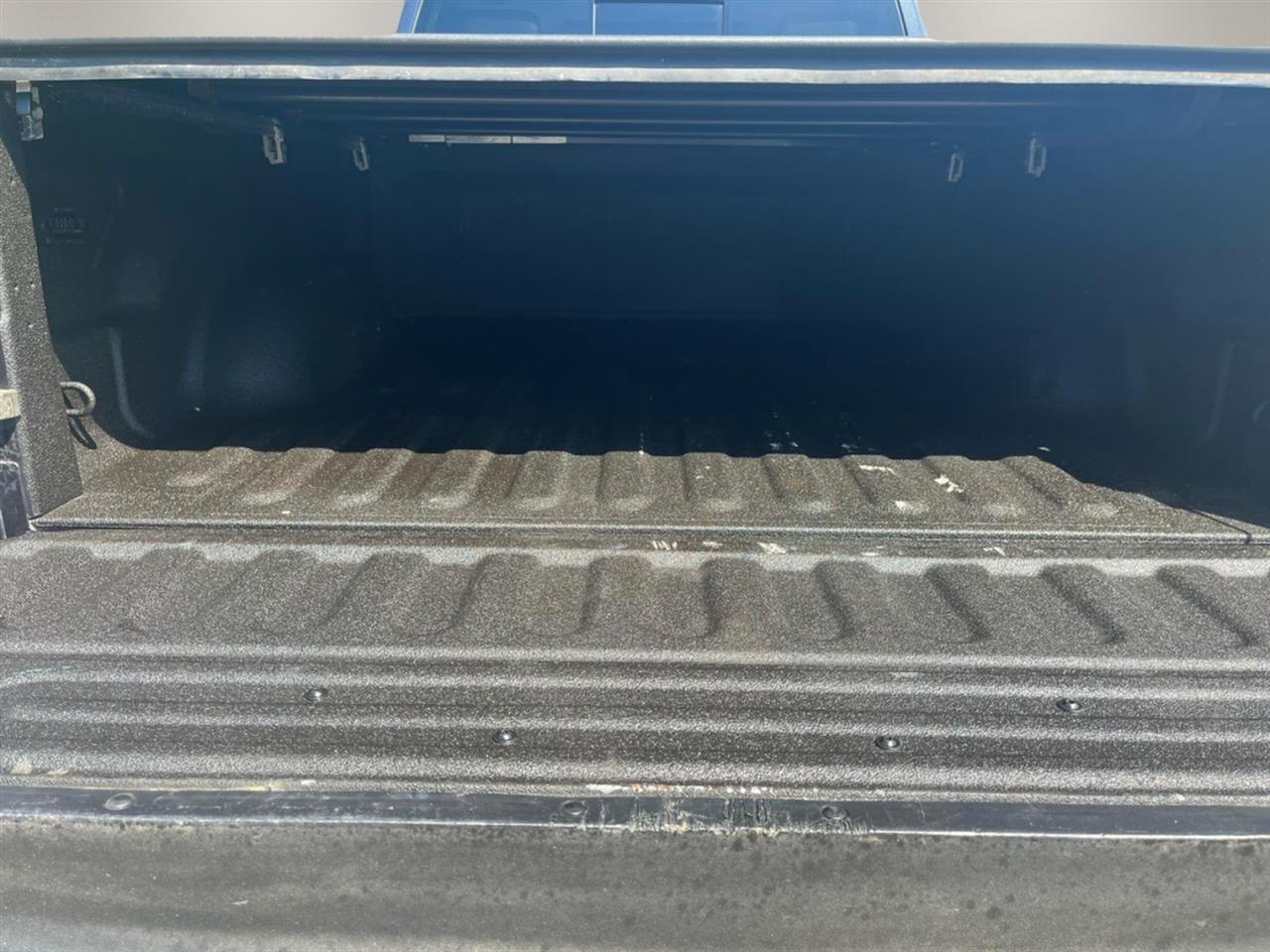 RAM 1500 4WD Quad Cab 140.5" Laramie 2014