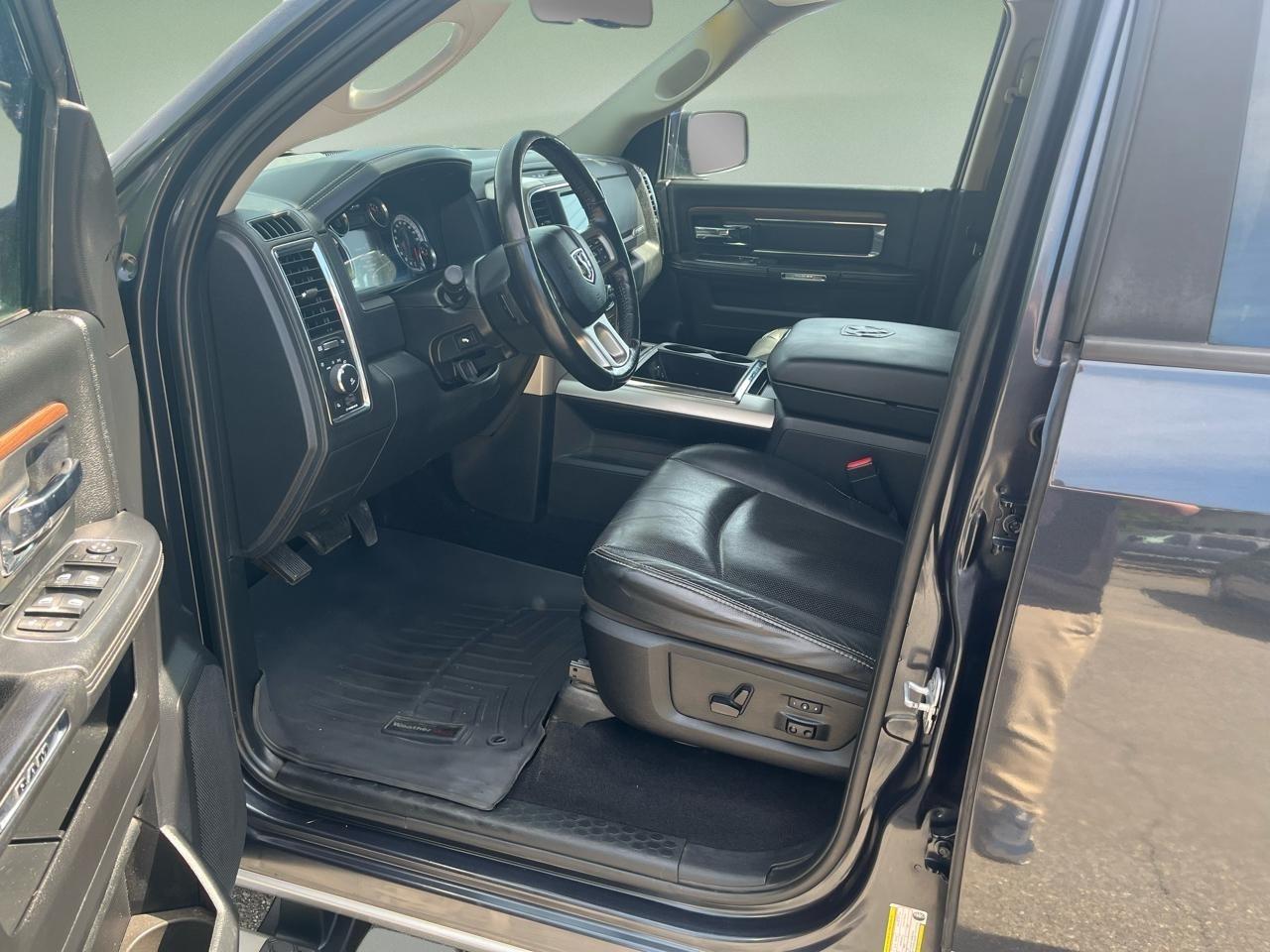 RAM 1500 4WD Quad Cab 140.5" Laramie 2014