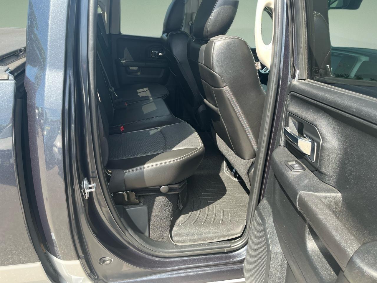 RAM 1500 4WD Quad Cab 140.5" Laramie 2014