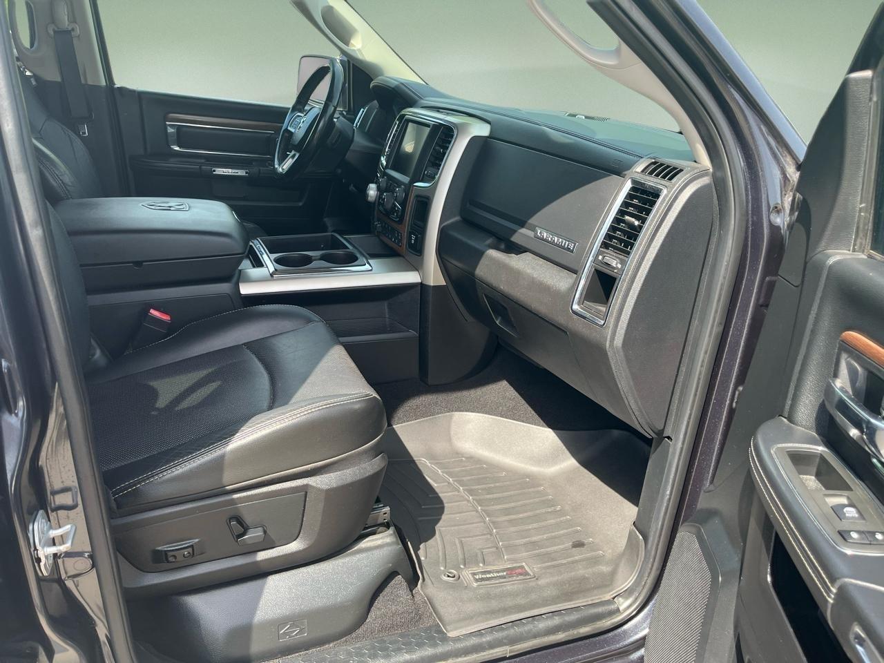 RAM 1500 4WD Quad Cab 140.5" Laramie 2014