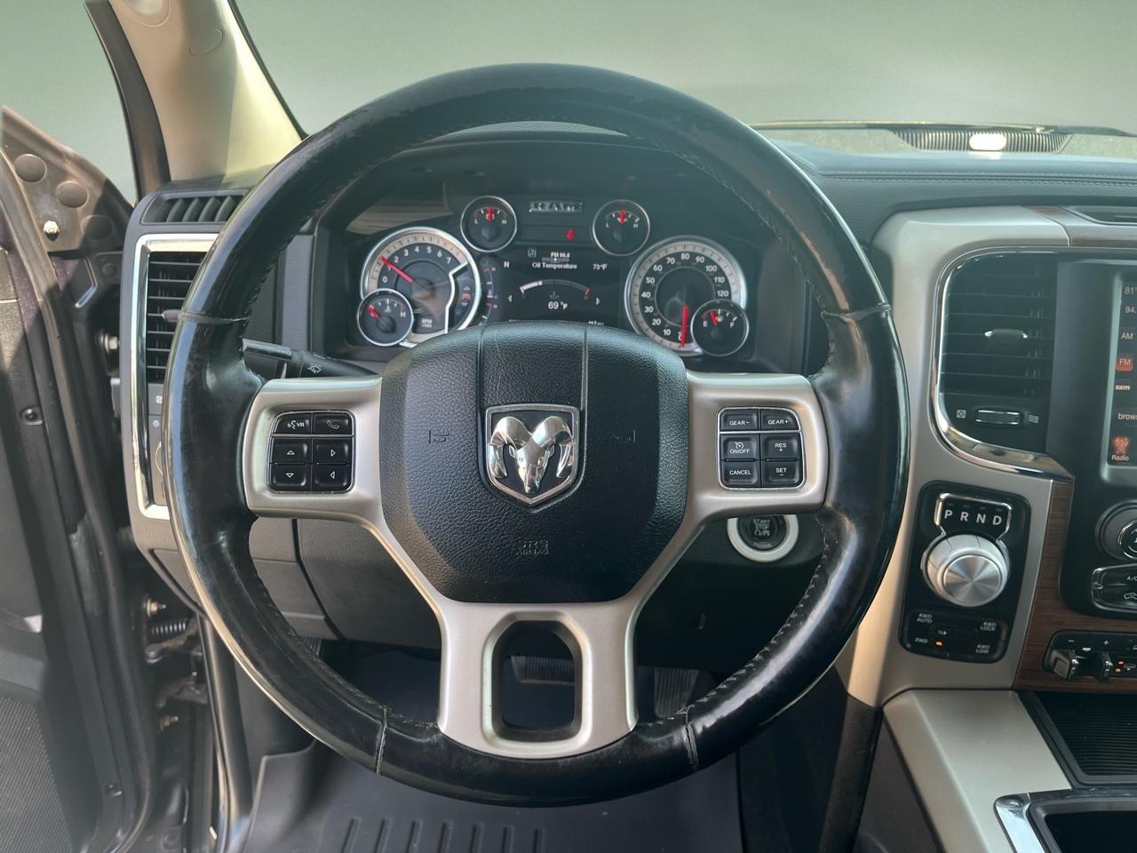 RAM 1500 4WD Quad Cab 140.5" Laramie 2014
