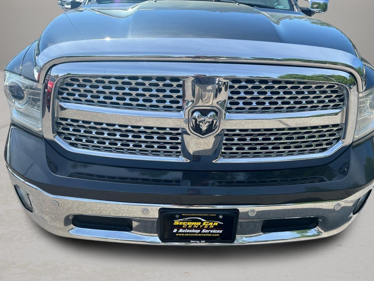RAM 1500 4WD Quad Cab 140.5" Laramie 2014