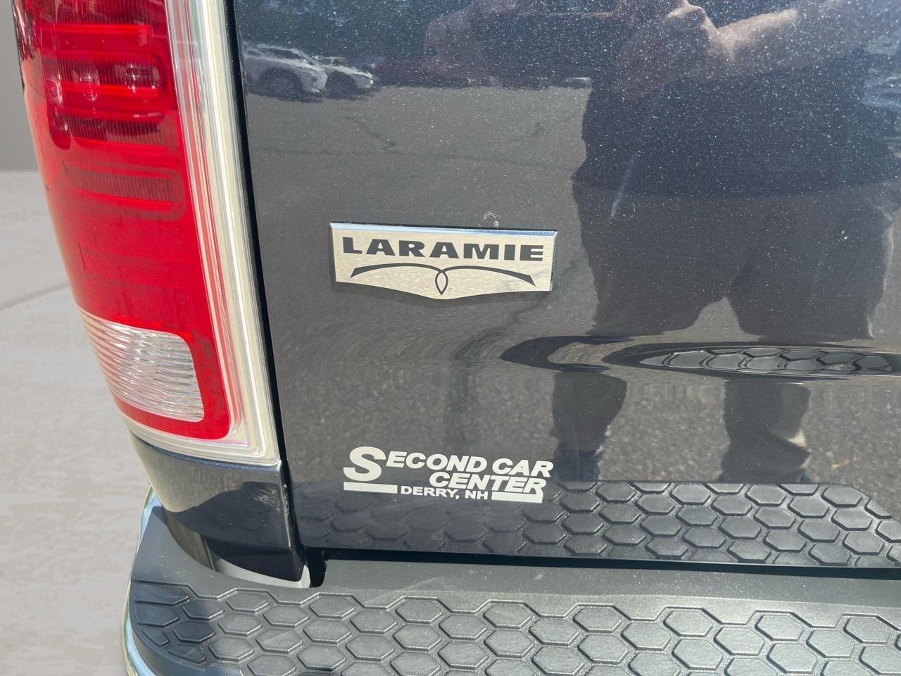 RAM 1500 4WD Quad Cab 140.5" Laramie 2014