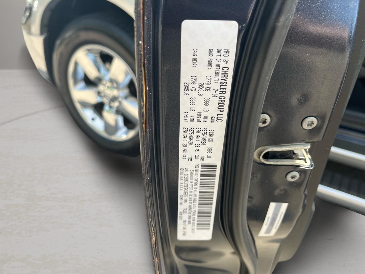 RAM 1500 4WD Quad Cab 140.5" Laramie 2014