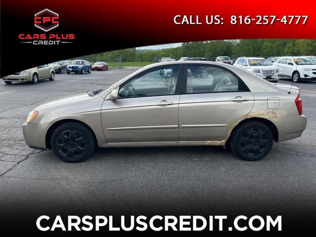 Gold 2005 Kia Spectra LX Sedan Front-Wheel Drive Automatic