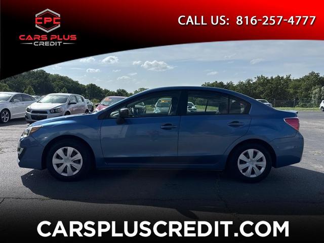 Blue 2015 Subaru Impreza Sedan All-Wheel Drive Manual
