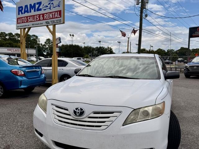 White 2009 Toyota Camry Sedan Front-Wheel Drive Automatic