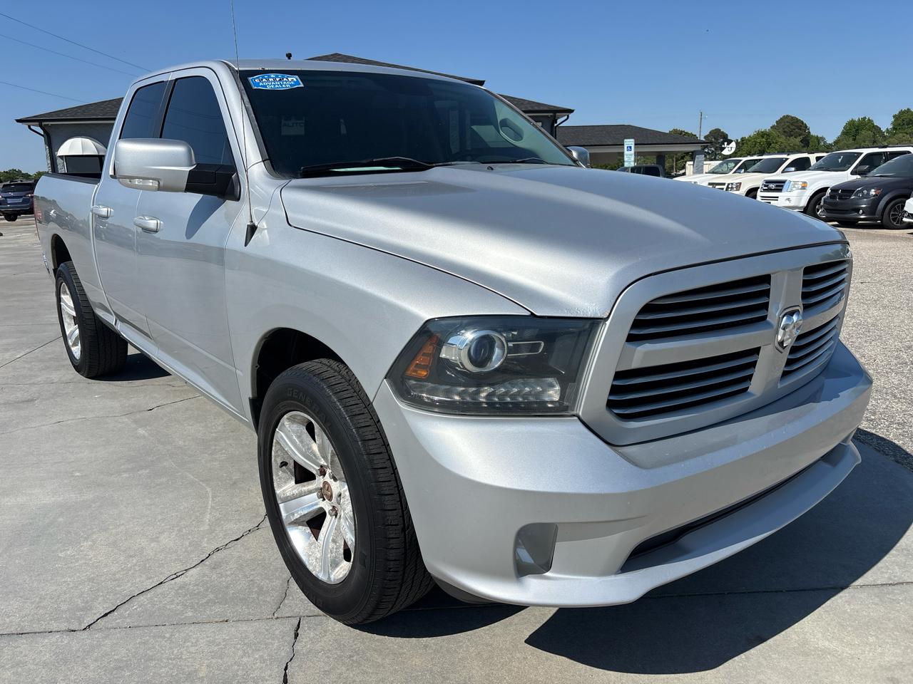 RAM 1500 4WD Quad Cab 140.5" Sport 2014
