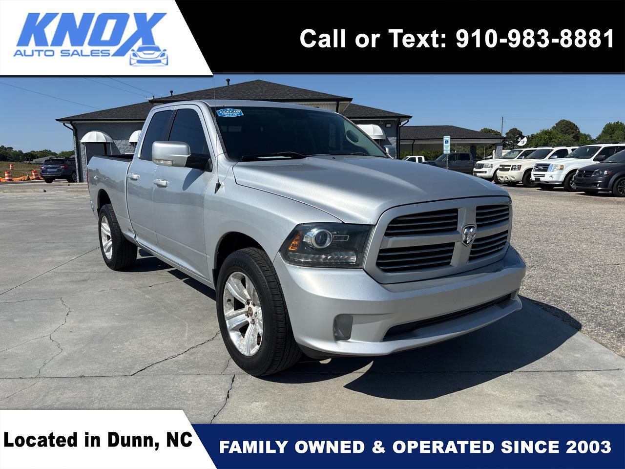 RAM 1500 4WD Quad Cab 140.5" Sport 2014
