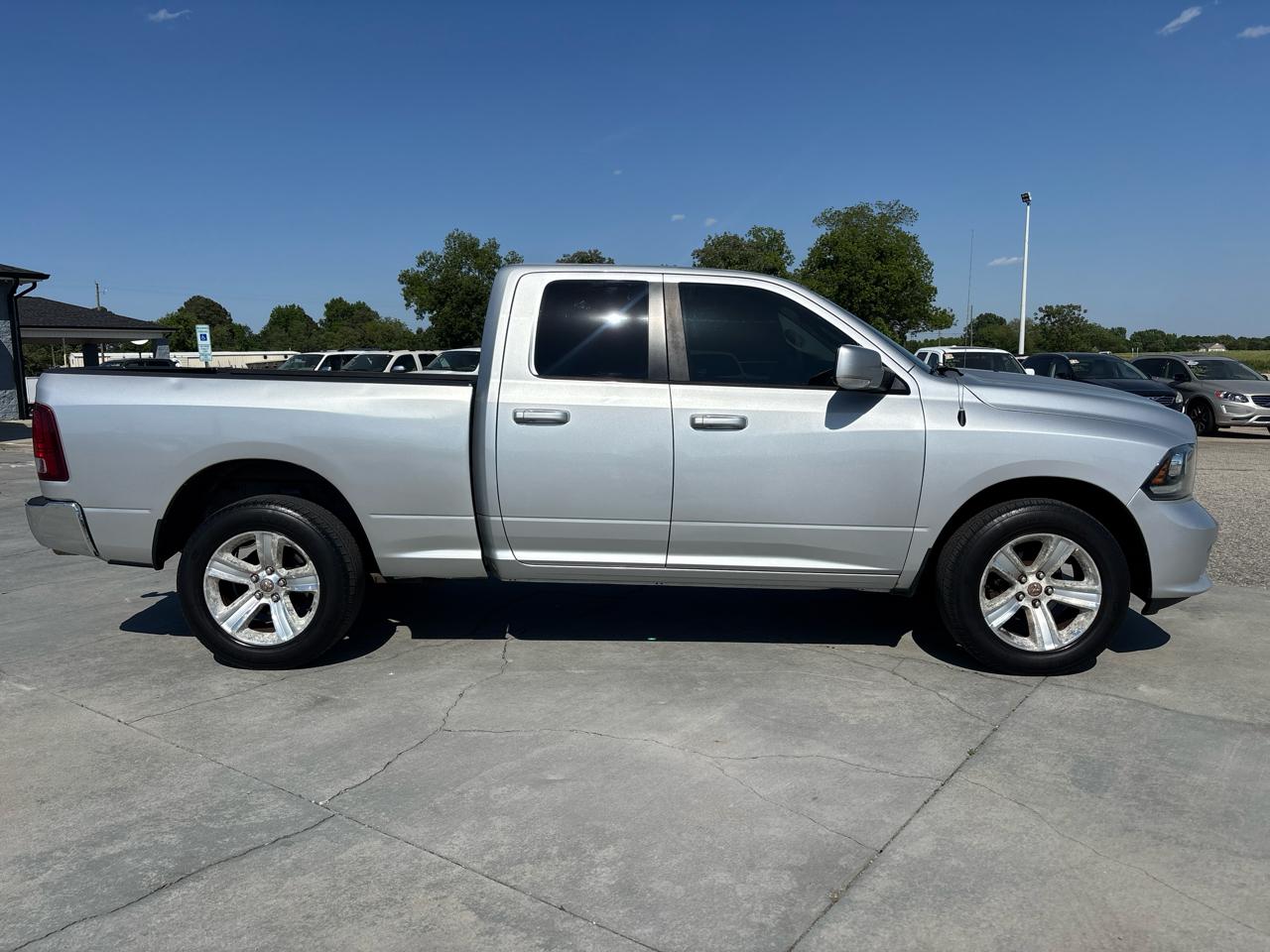 RAM 1500 4WD Quad Cab 140.5" Sport 2014