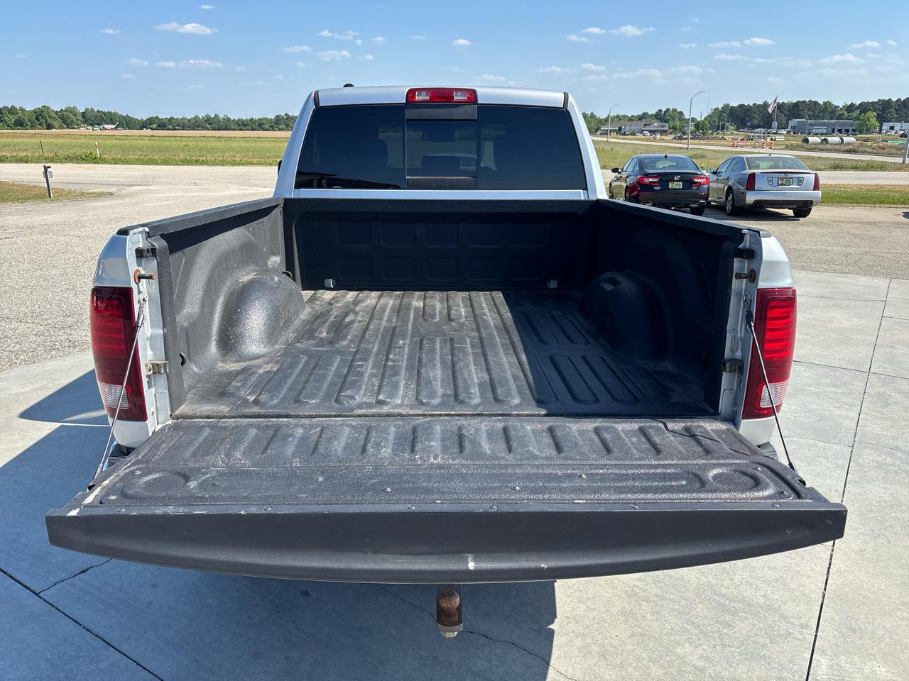 RAM 1500 4WD Quad Cab 140.5" Sport 2014