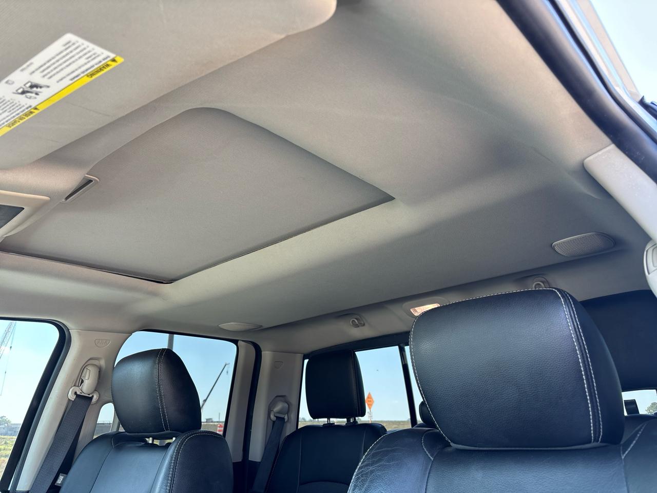 RAM 1500 4WD Quad Cab 140.5" Sport 2014