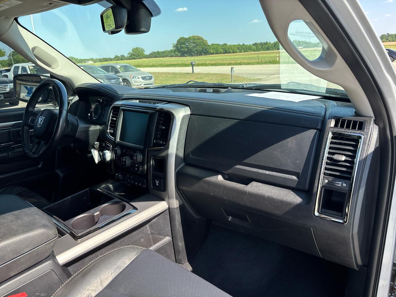 RAM 1500 4WD Quad Cab 140.5" Sport 2014