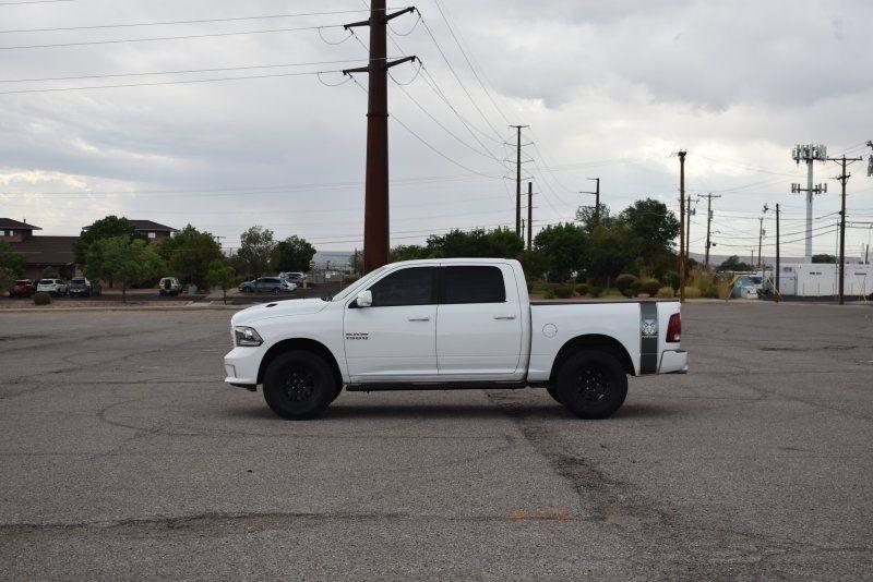 RAM 1500 4WD Crew Cab 140.5" Sport 2014