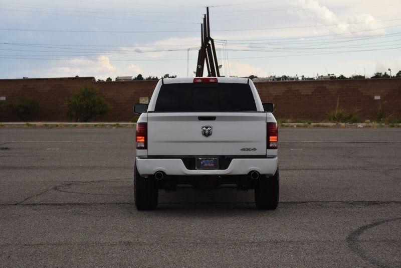 RAM 1500 4WD Crew Cab 140.5" Sport 2014
