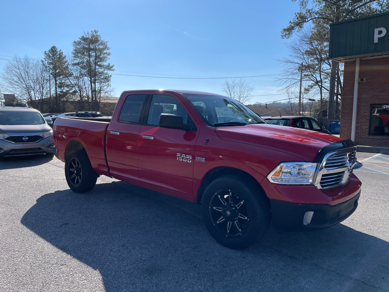 RAM 1500 4WD Quad Cab 140.5" SLT 2016