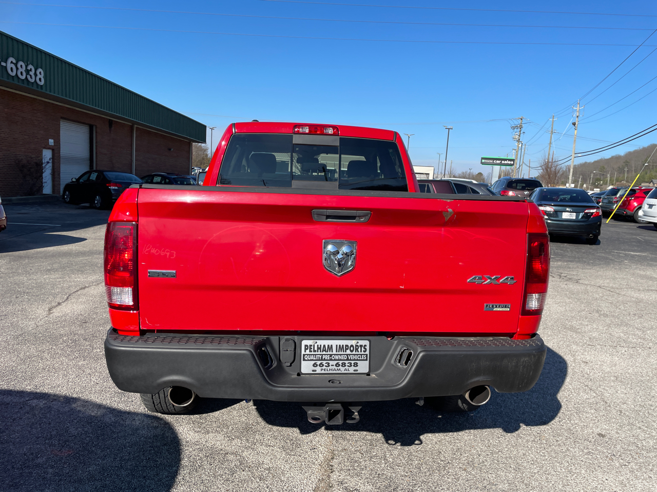 RAM 1500 4WD Quad Cab 140.5" SLT 2016