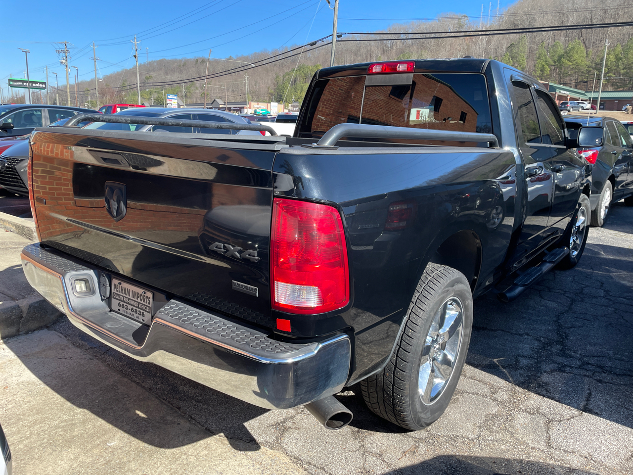 RAM 1500 4WD Quad Cab 140.5" SLT 2012