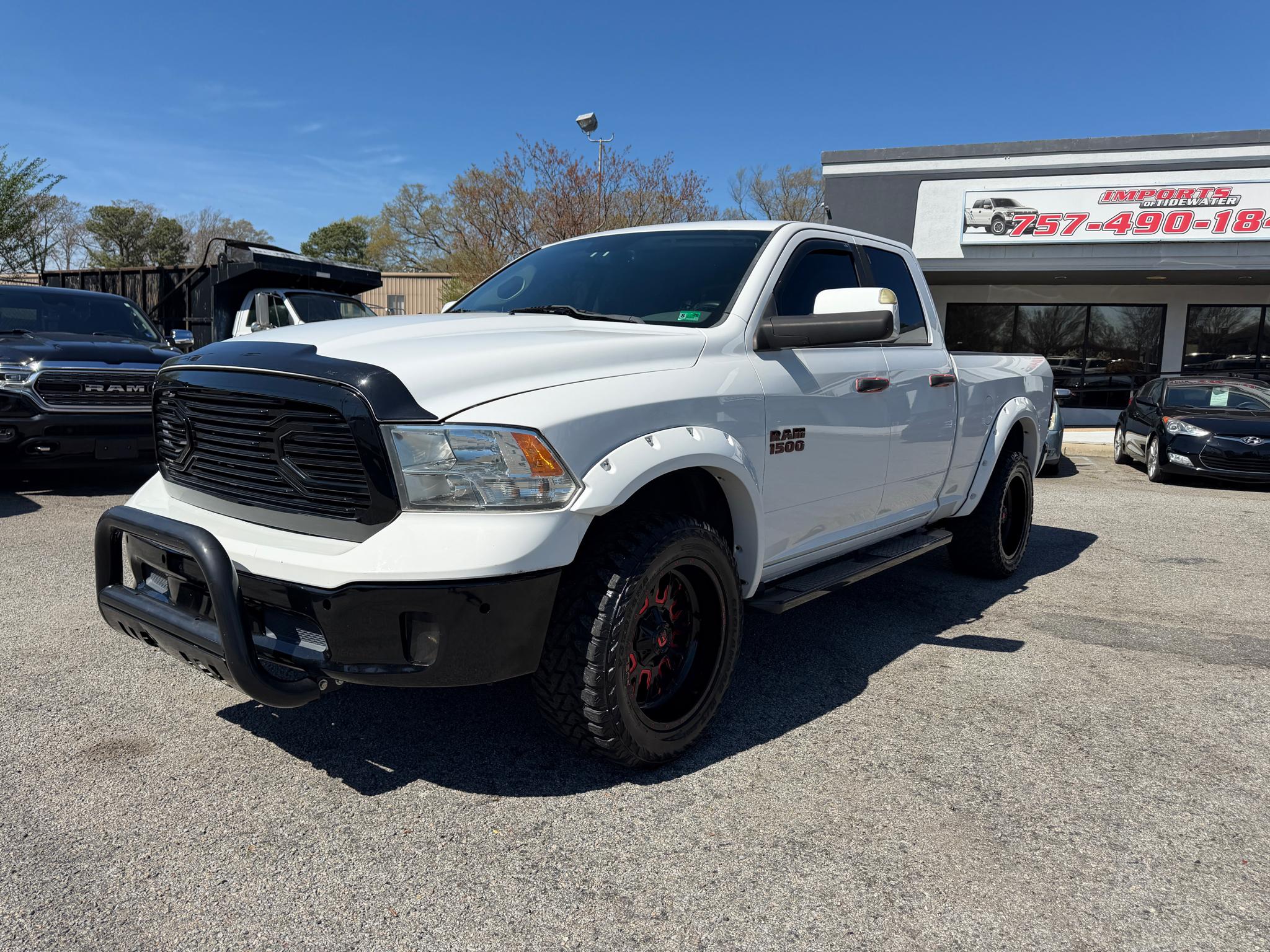 RAM 1500 4WD Quad Cab 140.5" SLT 2015