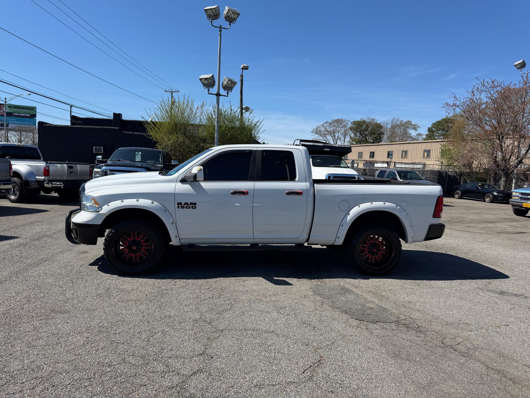 RAM 1500 4WD Quad Cab 140.5" SLT 2015