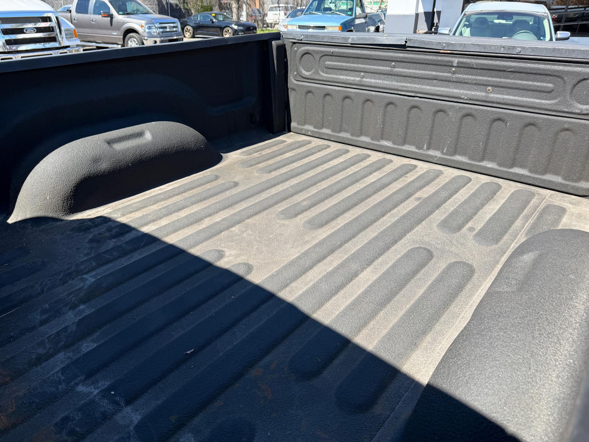 RAM 1500 4WD Quad Cab 140.5" SLT 2015