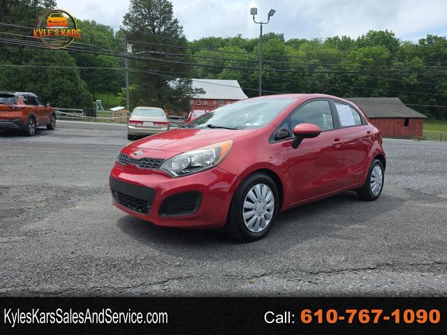 Orange 2014 Kia Rio Sedan Front-Wheel Drive Automatic