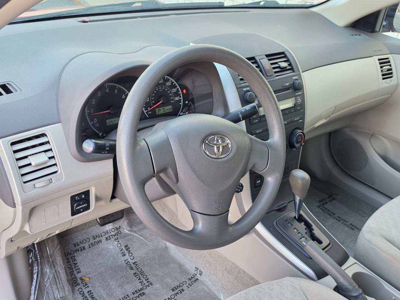 Toyota Corolla 4dr Sdn Man (Natl) 2009