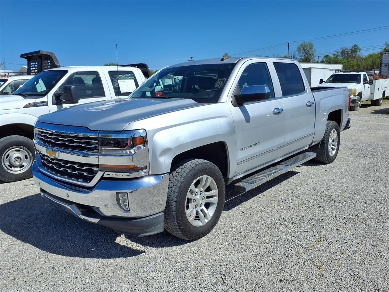 Silver 2016 Chevrolet Silverado 1500 Pickup Truck Four-Wheel Drive 8-Speed Automatic