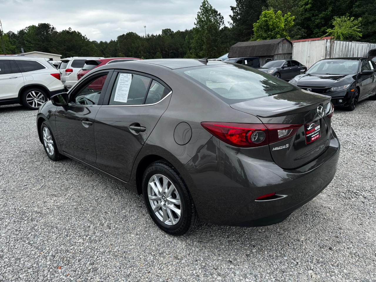 Mazda MAZDA3 4dr Sdn Man i Touring 2015