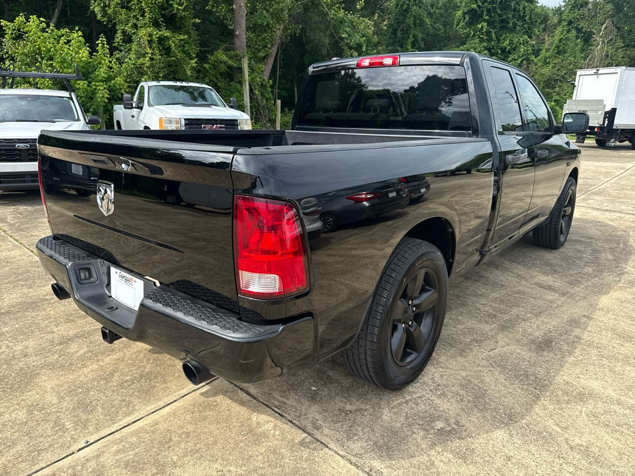 RAM 1500 2WD Quad Cab 140.5" Sport 2014