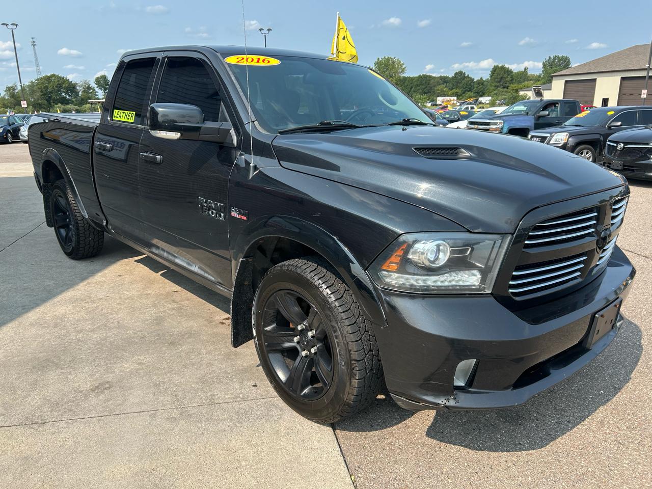 RAM 1500 4WD Quad Cab 140.5" Sport 2016