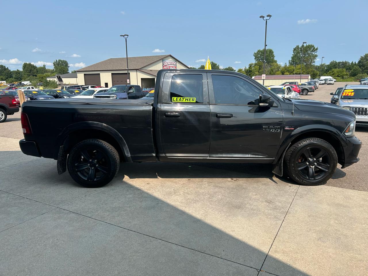 RAM 1500 4WD Quad Cab 140.5" Sport 2016