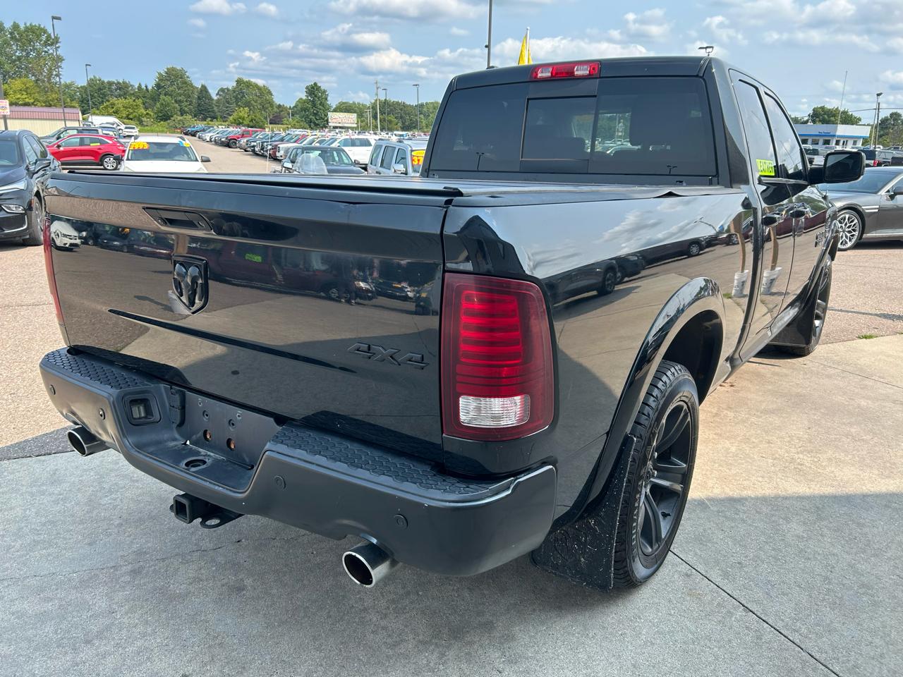 RAM 1500 4WD Quad Cab 140.5" Sport 2016