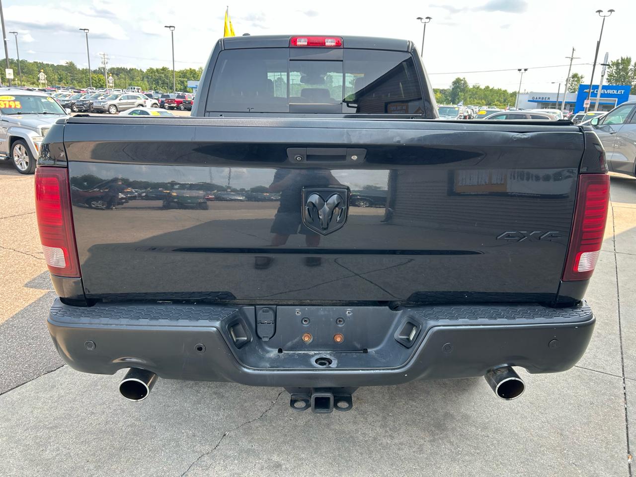 RAM 1500 4WD Quad Cab 140.5" Sport 2016