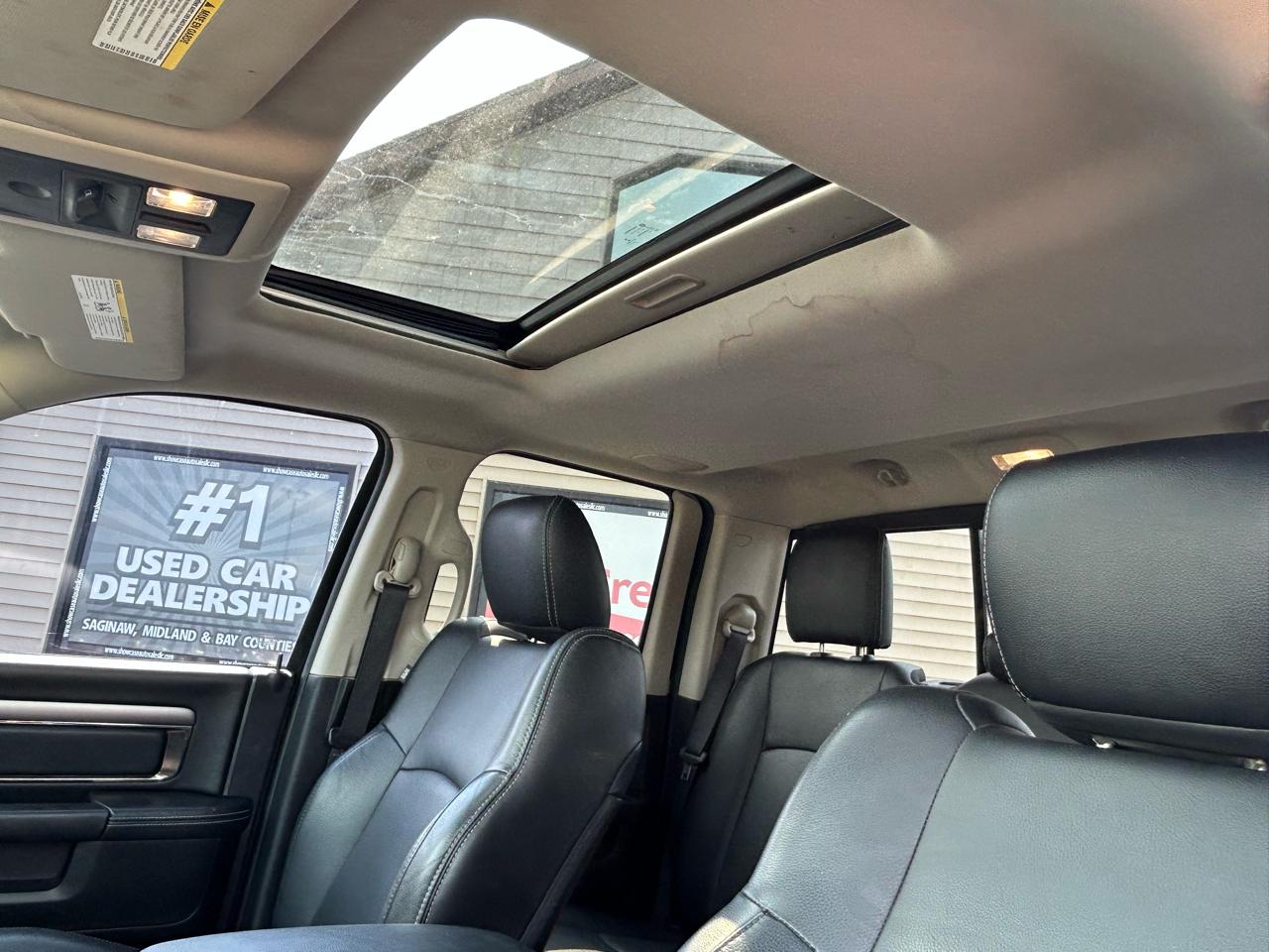 RAM 1500 4WD Quad Cab 140.5" Sport 2016
