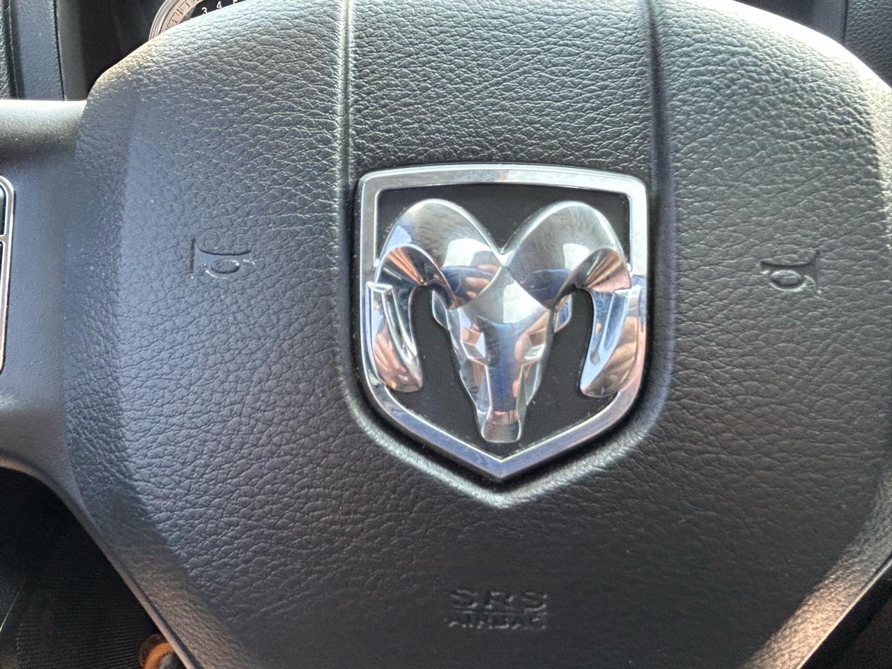 RAM 1500 4WD Quad Cab 140.5" Sport 2016