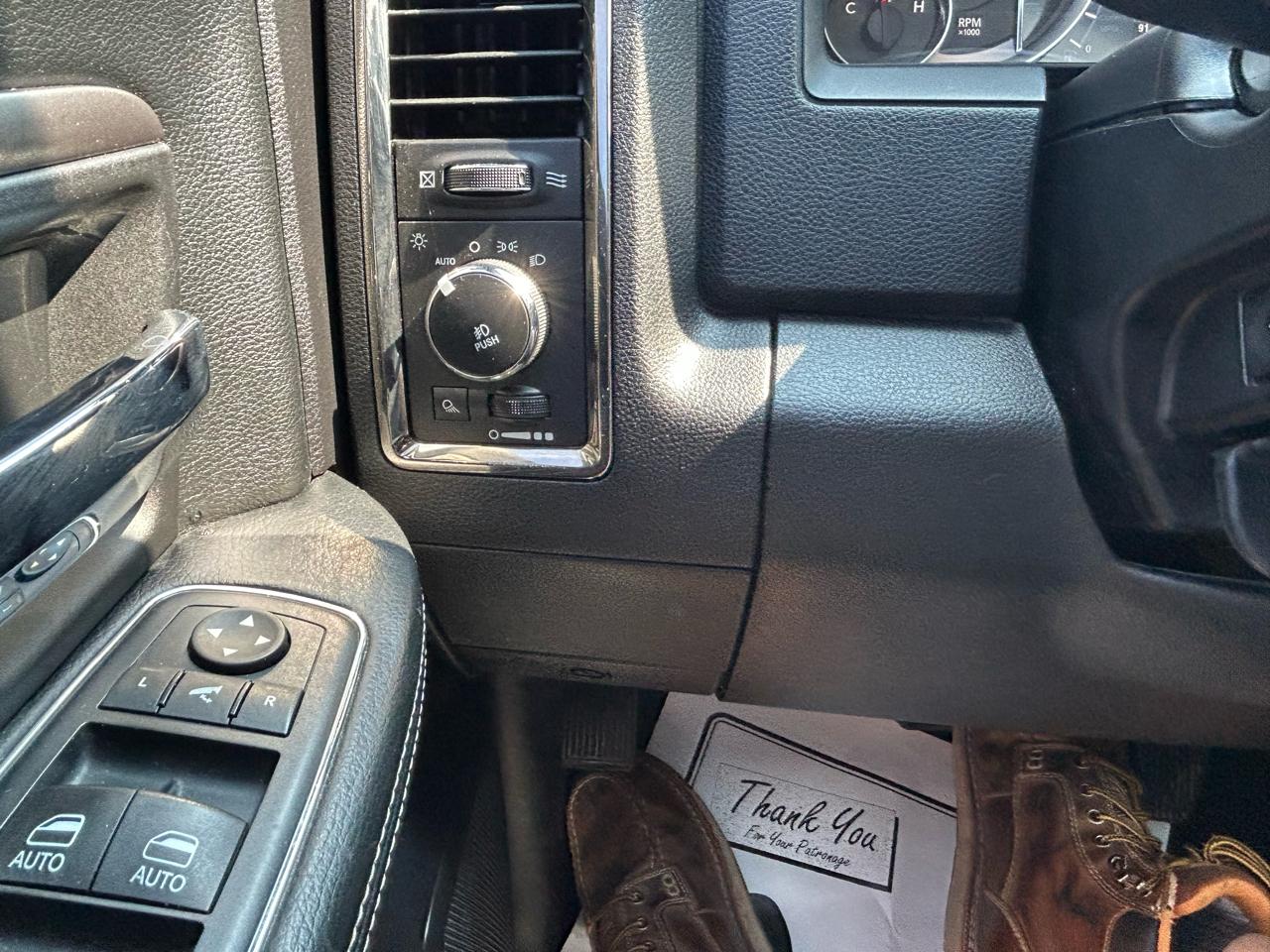 RAM 1500 4WD Quad Cab 140.5" Sport 2016