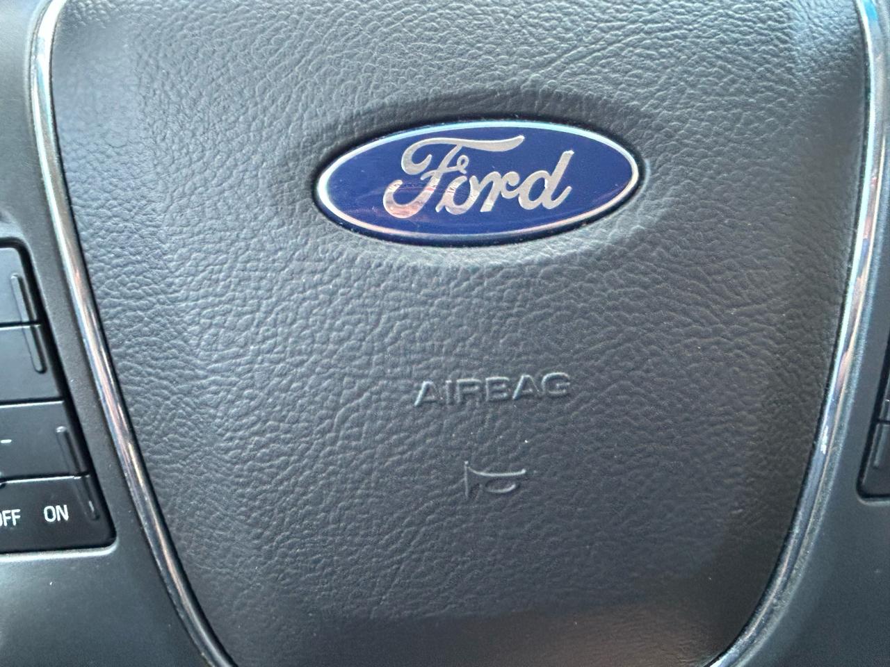 Ford Taurus 4dr Sdn SEL FWD 2010