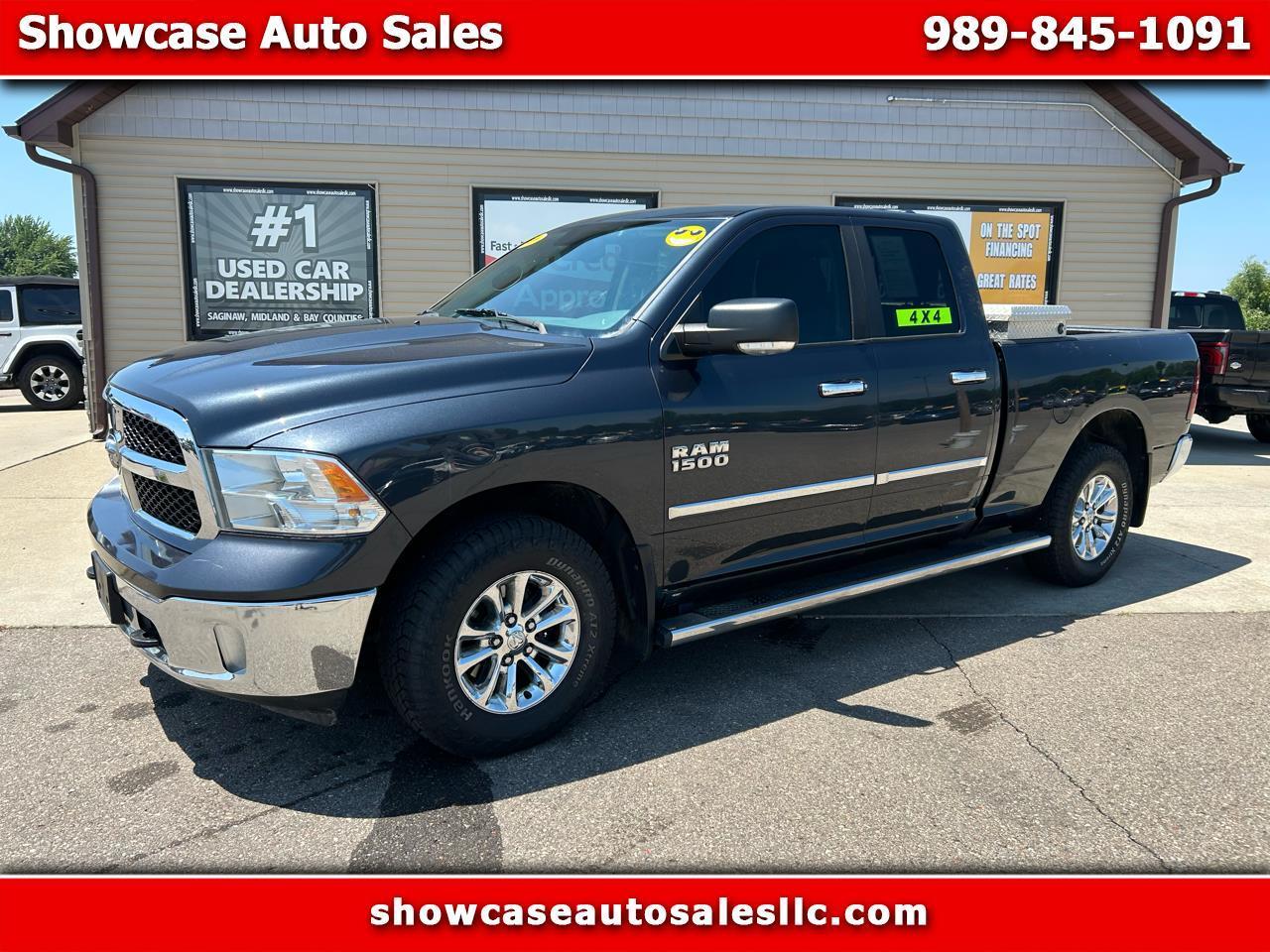 RAM 1500 4WD Quad Cab 140.5" SLT 2016