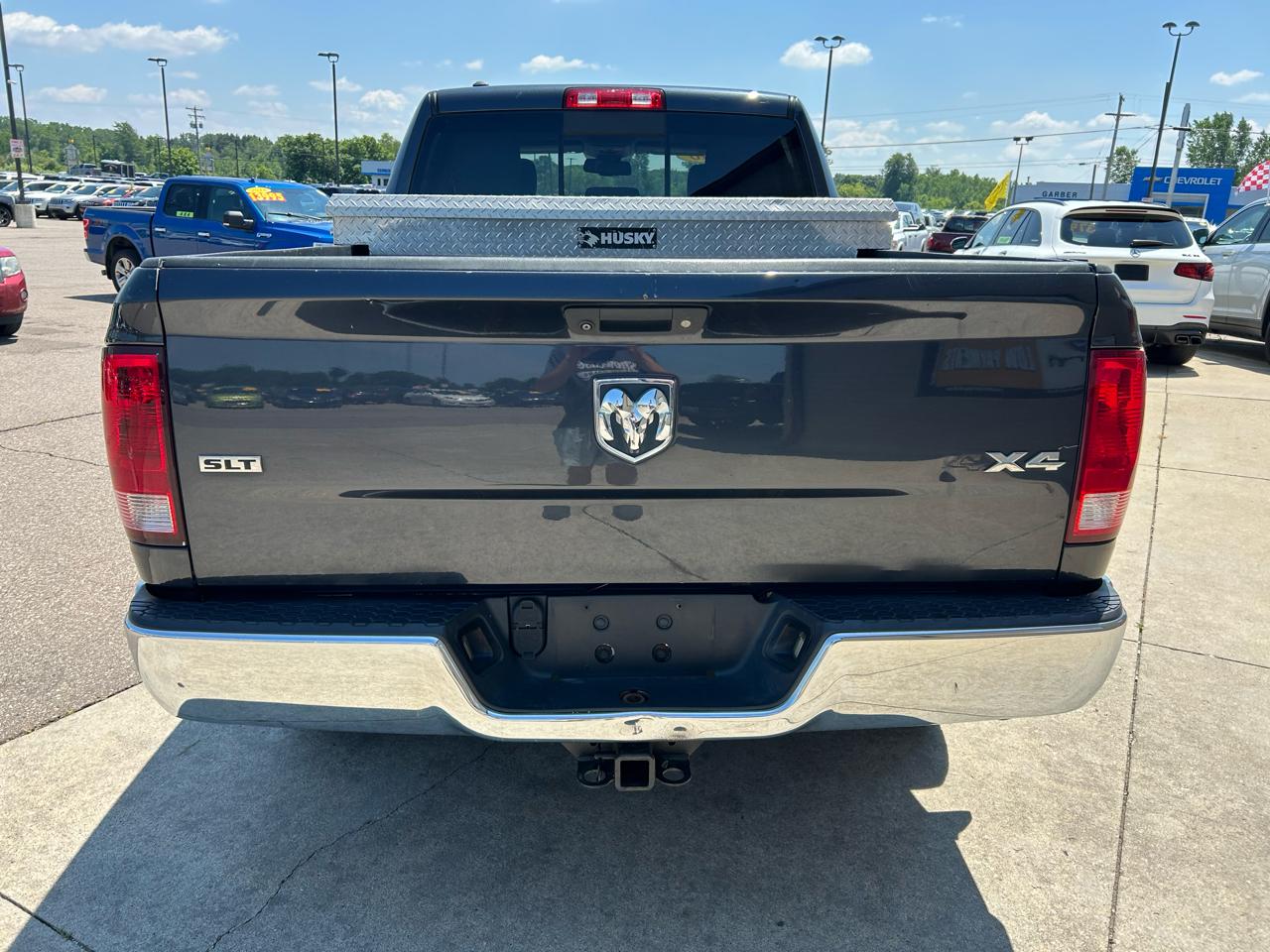RAM 1500 4WD Quad Cab 140.5" SLT 2016