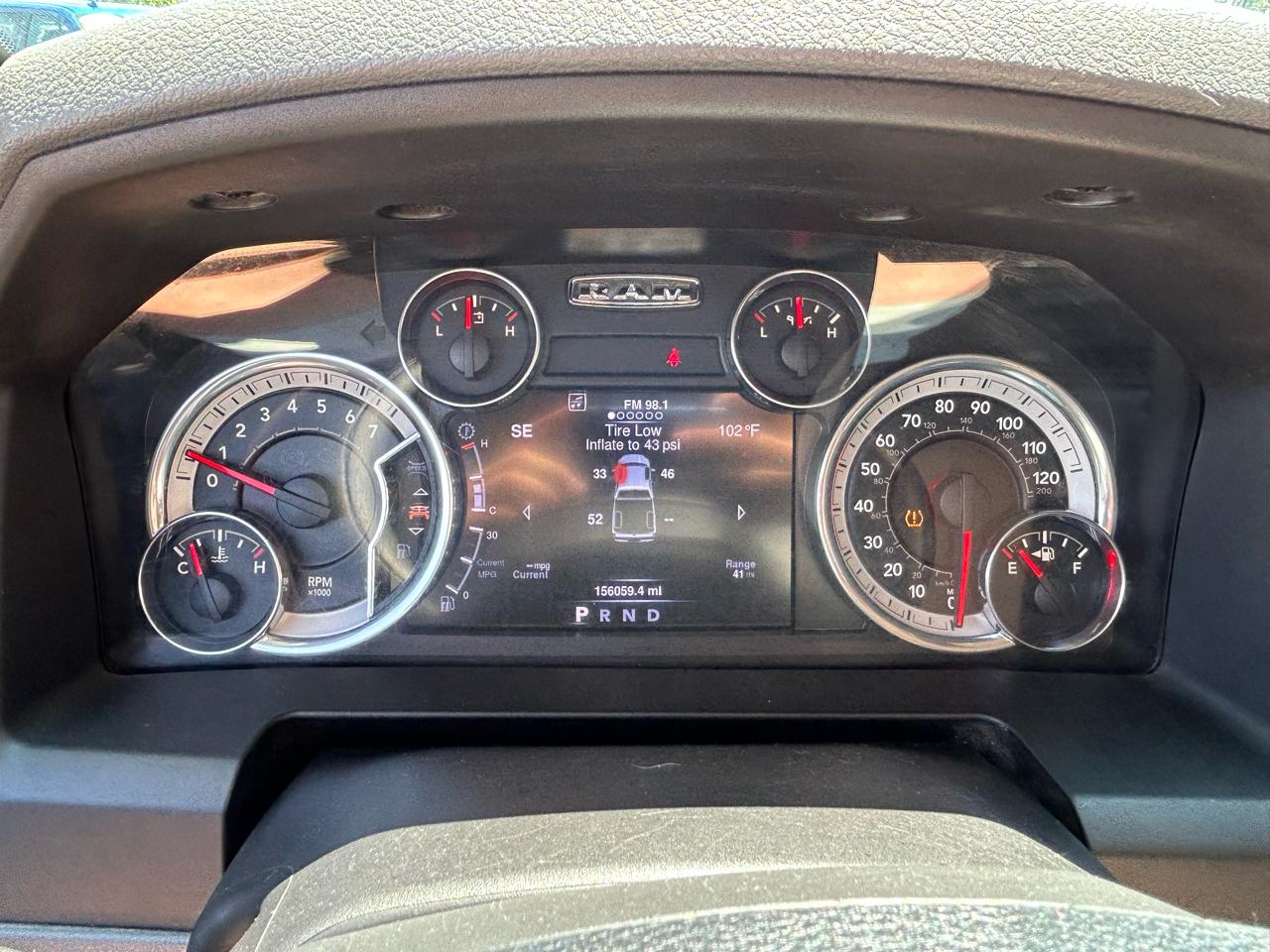 RAM 1500 4WD Quad Cab 140.5" SLT 2016
