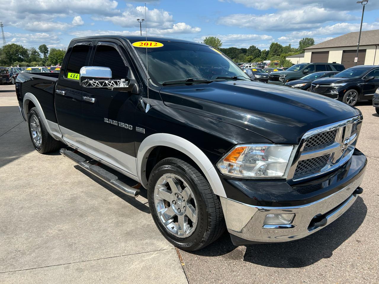 RAM 1500 4WD Quad Cab 140.5" Laramie 2012